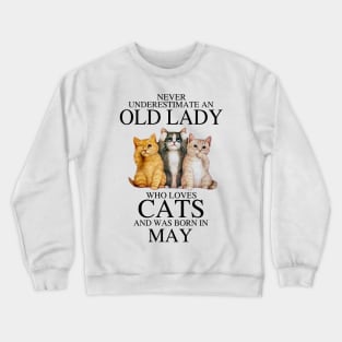 Never Underestimate An Old Lady Who Loves Cats May Crewneck Sweatshirt